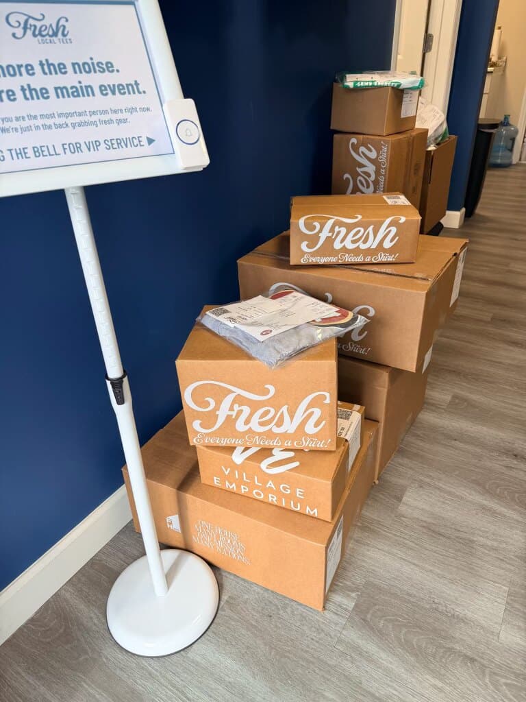 Fresh Local Tees boxes ready for pickup and delivery